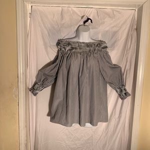 Women black and white stripes blouse.